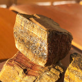 Working On Tigerās Eye Rough Stone - rawstone