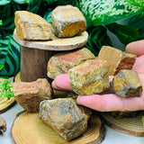 Working On Tigerās Eye Rough Stone - rawstone