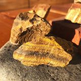 Working On Tigerās Eye Rough Stone - rawstone
