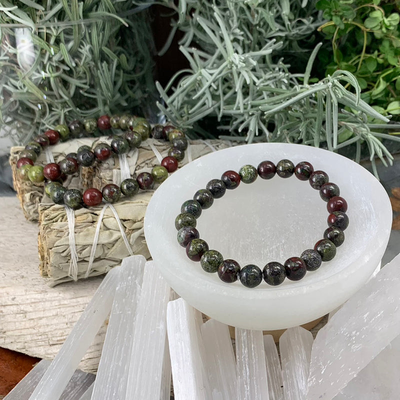 Mala zmajeva krvava zapestnica z žametno torbico