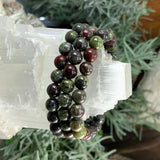 Mala zmajeva krvava zapestnica z žametno torbico